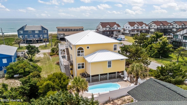 2414 Ocean Dr, Emerald Isle, NC 28594 - drone / aerial view of a pool area and a nearby body of water