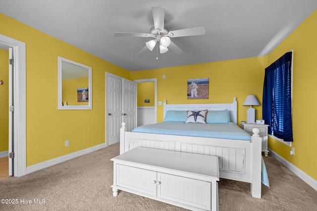 2414 Ocean Dr, Emerald Isle, NC 28594 - bedroom with carpet flooring, baseboards, and a ceiling fan