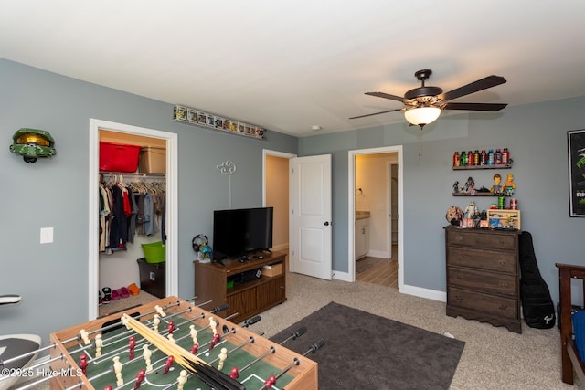 111 Pinelands Vis, Jackson Springs, NC 27281 - living room featuring ceiling fan, light carpet, and baseboards