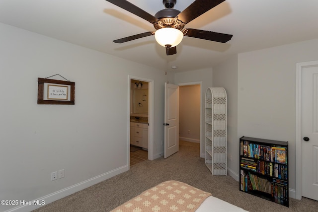 111 Pinelands Vis, Jackson Springs, NC 27281 - carpeted bedroom featuring a heating unit, baseboards, connected bathroom, and a ceiling fan