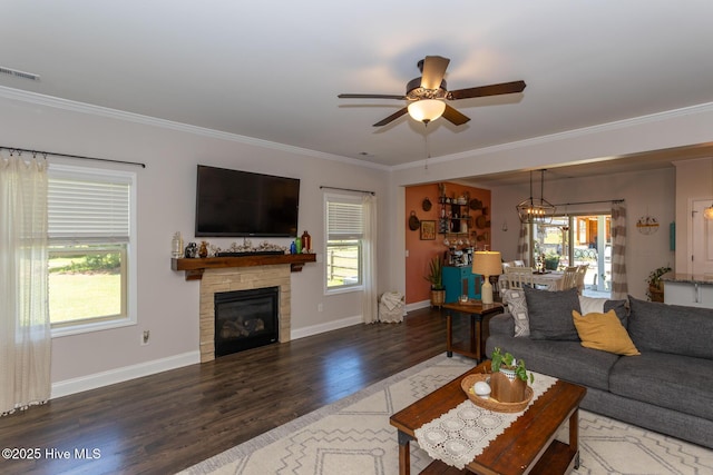 111 Pinelands Vis, Jackson Springs, NC 27281 - living area featuring wood finished floors, crown molding, ceiling fan, and healthy amount of natural light