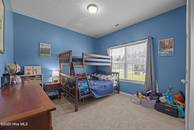 3412 Lefringhouse Ln, New Bern, NC 28562 - bedroom featuring carpet flooring, a textured ceiling, and baseboards