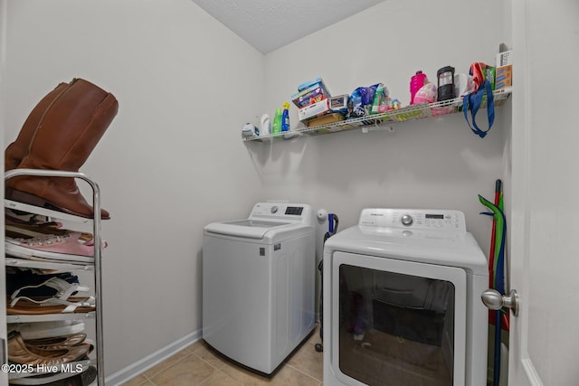 3412 Lefringhouse Ln, New Bern, NC 28562 - laundry room with independent washer and dryer, baseboards, and light tile patterned floors