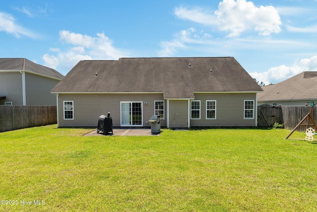 3412 Lefringhouse Ln, New Bern, NC 28562 - rear view of house featuring a patio area and roof with shingles