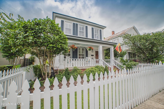 1309 N Pasteur St, New Bern, NC 28560 - view of front of property featuring covered porch and a fenced front yard