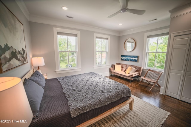 1309 N Pasteur St, New Bern, NC 28560 - bedroom featuring multiple windows, dark wood-type flooring, ornamental molding, recessed lighting, and ceiling fan