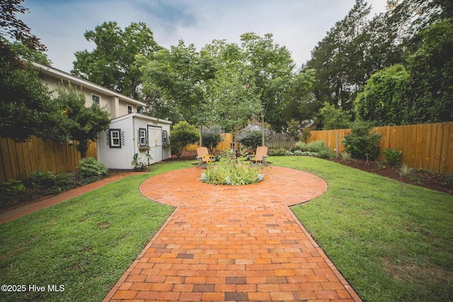1309 N Pasteur St, New Bern, NC 28560 - fenced backyard featuring a patio area and a shed