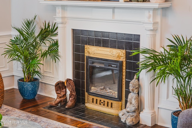 1309 N Pasteur St, New Bern, NC 28560 - detailed view of a tiled fireplace and wood finished floors