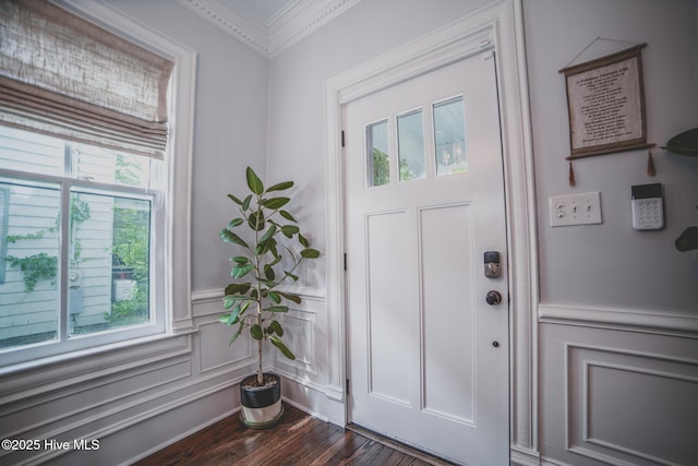 1309 N Pasteur St, New Bern, NC 28560 - entryway featuring a decorative wall, dark wood-style floors, ornamental molding, and a wainscoted wall