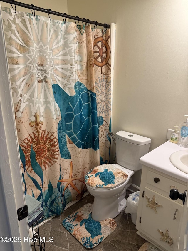 1164 Hibbs Rd, Newport, NC 28570 - bathroom with vanity, toilet, and a shower with curtain