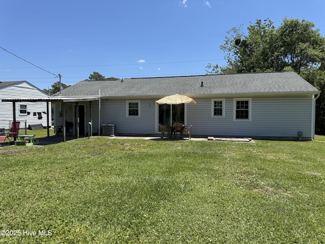 1164 Hibbs Rd, Newport, NC 28570 - rear view of property with a patio area, central AC, a yard, and roof with shingles