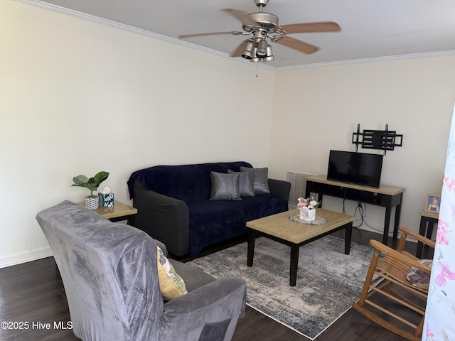 1164 Hibbs Rd, Newport, NC 28570 - living area with ornamental molding, wood finished floors, a ceiling fan, and baseboards