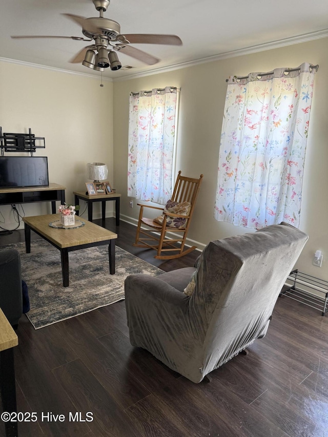 1164 Hibbs Rd, Newport, NC 28570 - living area featuring crown molding, a ceiling fan, wood finished floors, and baseboards