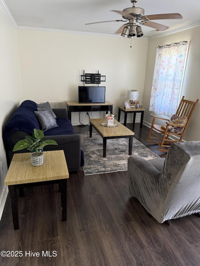 1164 Hibbs Rd, Newport, NC 28570 - living area with wood finished floors, crown molding, ceiling fan, and baseboards