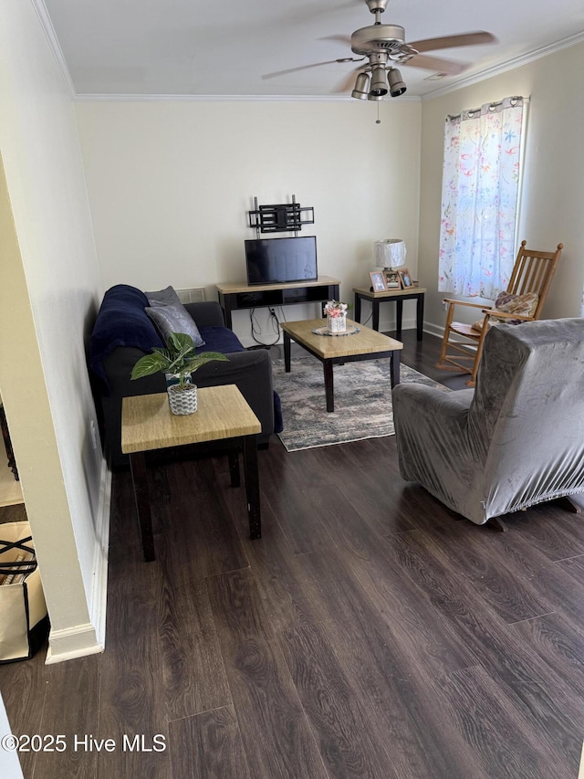 1164 Hibbs Rd, Newport, NC 28570 - living area with ornamental molding, wood finished floors, a ceiling fan, and baseboards