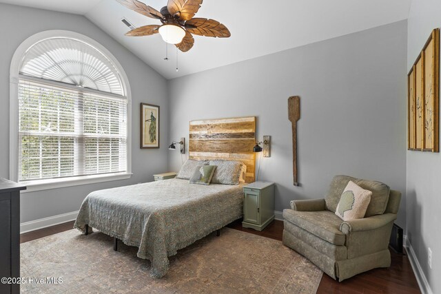 124 NE 35th St, Oak Island, NC 28465 - bedroom featuring lofted ceiling, wood finished floors, baseboards, and ceiling fan