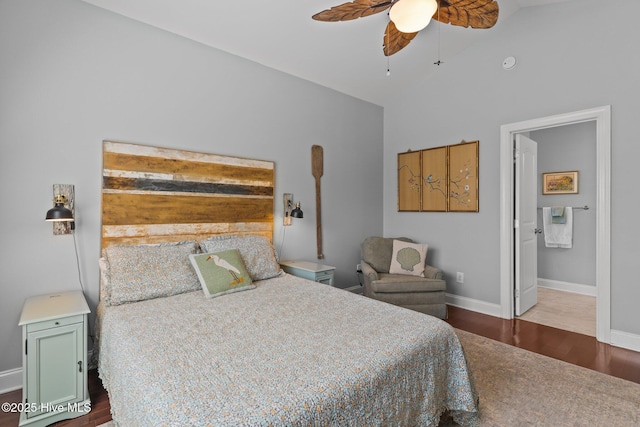 124 NE 35th St, Oak Island, NC 28465 - bedroom with wood finished floors, baseboards, high vaulted ceiling, a ceiling fan, and ensuite bath
