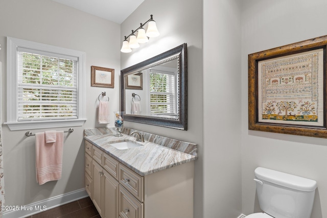 124 NE 35th St, Oak Island, NC 28465 - half bath featuring vanity, baseboards, and toilet