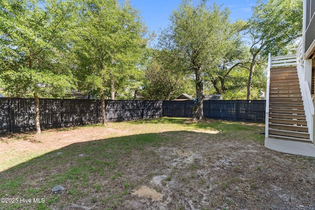 124 NE 35th St, Oak Island, NC 28465 - view of yard featuring stairs