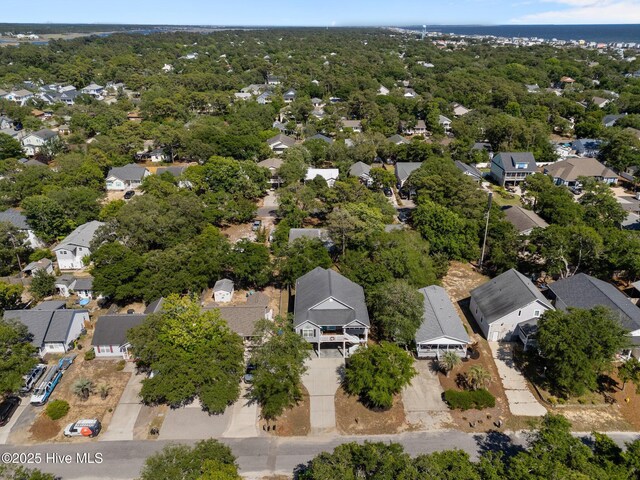 124 NE 35th St, Oak Island, NC 28465 - aerial overview of property's location with nearby suburban area