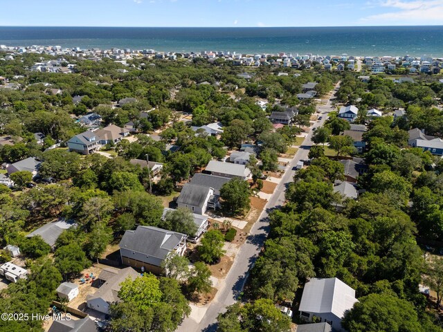 124 NE 35th St, Oak Island, NC 28465 - aerial view of residential area with a large body of water