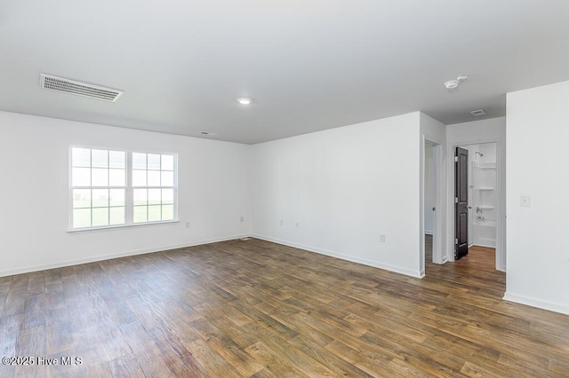 101 Jessica Ct, Vanceboro, NC 28586 - spare room featuring dark wood-style floors, baseboards, a smoke detector, and recessed lighting