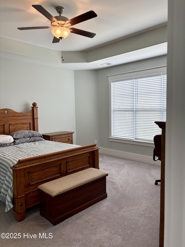 7000 Sevilleen Dr SW, Ocean Isle Beach, NC 28469 - carpeted bedroom featuring baseboards and a ceiling fan