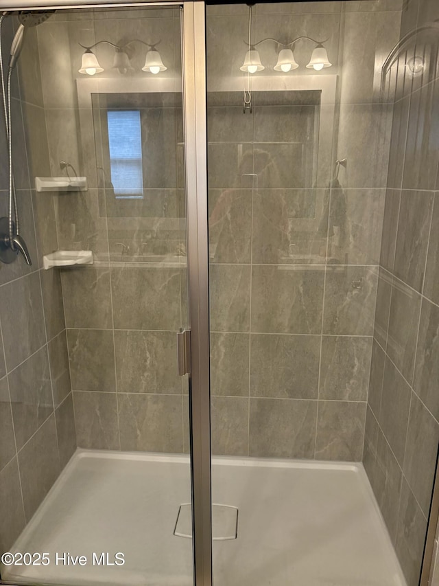 7000 Sevilleen Dr SW, Ocean Isle Beach, NC 28469 - bathroom featuring a stall shower