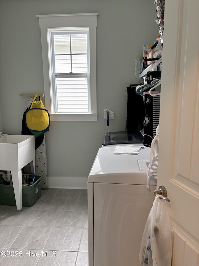 7000 Sevilleen Dr SW, Ocean Isle Beach, NC 28469 - laundry room featuring separate washer and dryer and light marble finish flooring