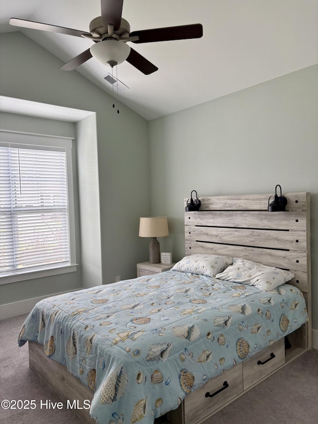 7000 Sevilleen Dr SW, Ocean Isle Beach, NC 28469 - carpeted bedroom featuring lofted ceiling, baseboards, and ceiling fan
