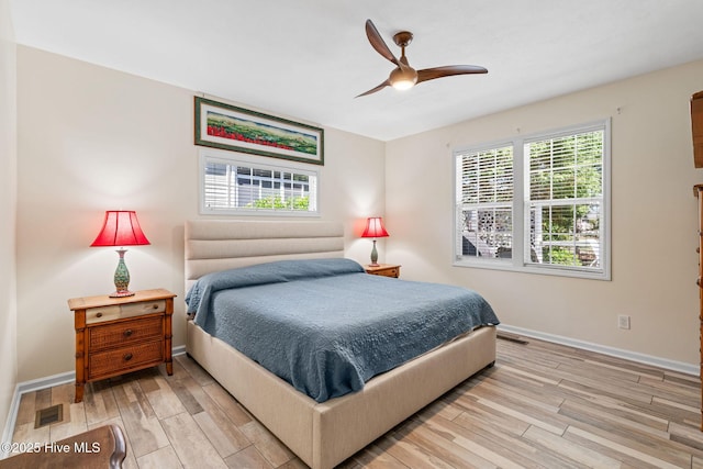 3193 Wexford Way, Southport, NC 28461 - bedroom featuring light wood finished floors, baseboards, and ceiling fan