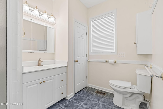 3193 Wexford Way, Southport, NC 28461 - bathroom with toilet, vanity, and baseboards
