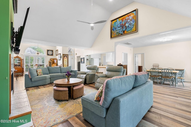 3193 Wexford Way, Southport, NC 28461 - living area featuring high vaulted ceiling, ceiling fan, and wood finished floors
