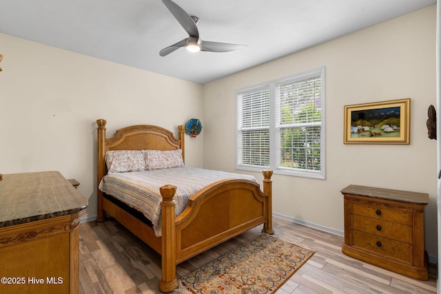 3193 Wexford Way, Southport, NC 28461 - bedroom with light wood-style floors, baseboards, and ceiling fan