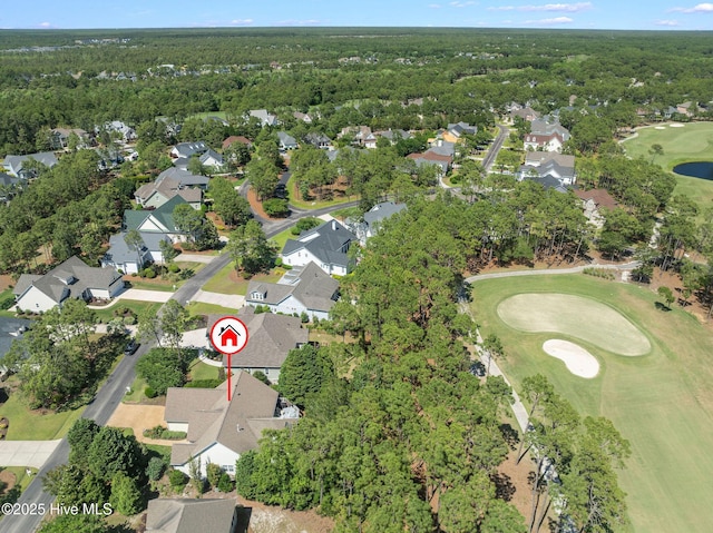 3193 Wexford Way, Southport, NC 28461 - aerial view of property's location with nearby suburban area, a golf club, and a heavily wooded area