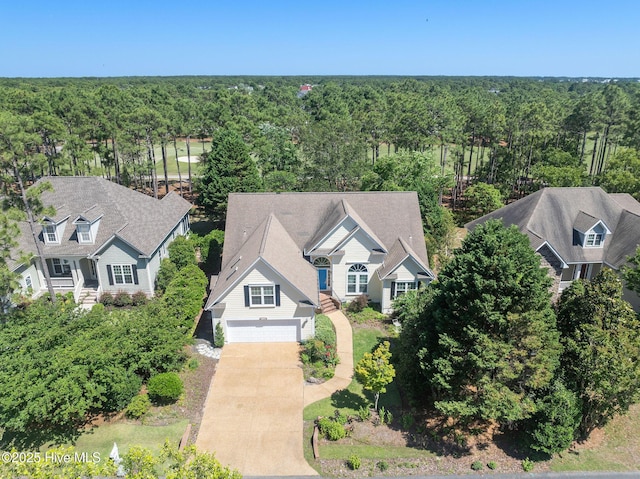 3193 Wexford Way, Southport, NC 28461 - aerial view of property and surrounding area with a heavily wooded area