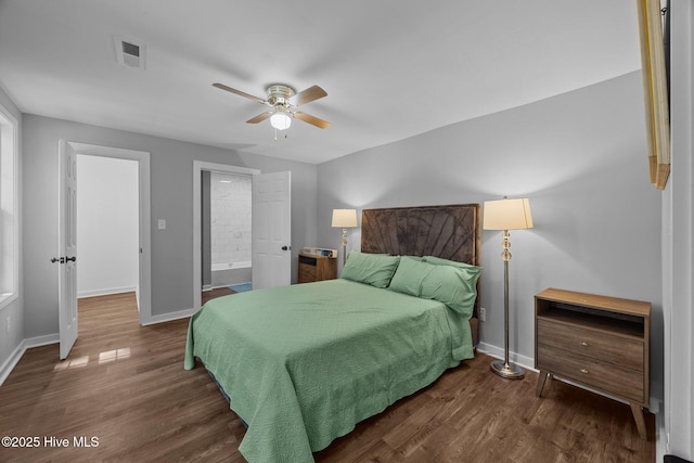 10378 Neuse Rd, Grantsboro, NC 28529 - bedroom featuring baseboards, wood finished floors, ensuite bathroom, and ceiling fan