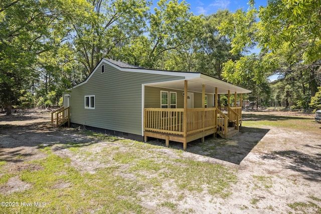 10378 Neuse Rd, Grantsboro, NC 28529 - view of side of property with crawl space and view of scattered trees