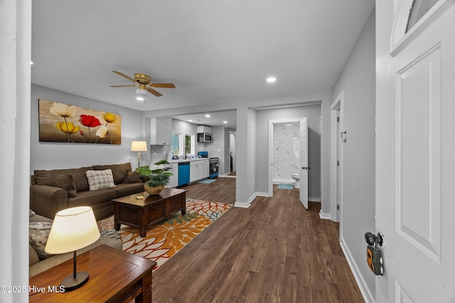 10378 Neuse Rd, Grantsboro, NC 28529 - living area featuring a ceiling fan, dark wood-style flooring, recessed lighting, and baseboards