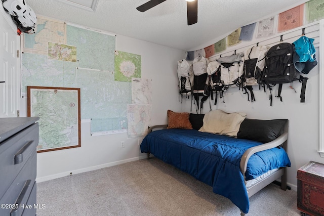2824 Sapling Cir, Wilmington, NC 28411 - carpeted bedroom with ceiling fan, a textured ceiling, and baseboards