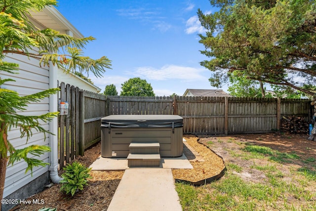 2824 Sapling Cir, Wilmington, NC 28411 - fenced backyard with a hot tub