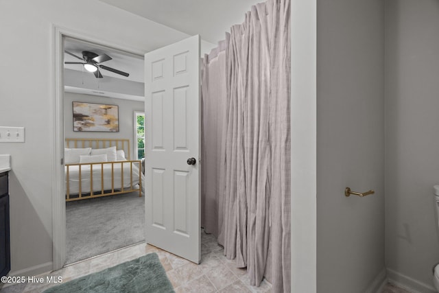 301 Haws Run Rd, Jacksonville, NC 28540 - full bathroom featuring toilet, vanity, a ceiling fan, and curtained shower
