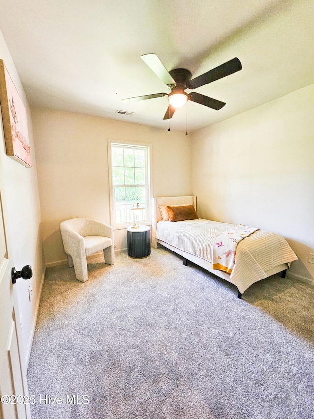 301 Haws Run Rd, Jacksonville, NC 28540 - carpeted bedroom with a ceiling fan and baseboards
