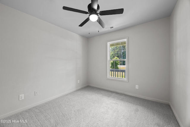301 Haws Run Rd, Jacksonville, NC 28540 - carpeted empty room featuring baseboards and ceiling fan