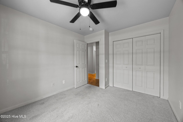 301 Haws Run Rd, Jacksonville, NC 28540 - unfurnished bedroom featuring carpet flooring, baseboards, and a closet