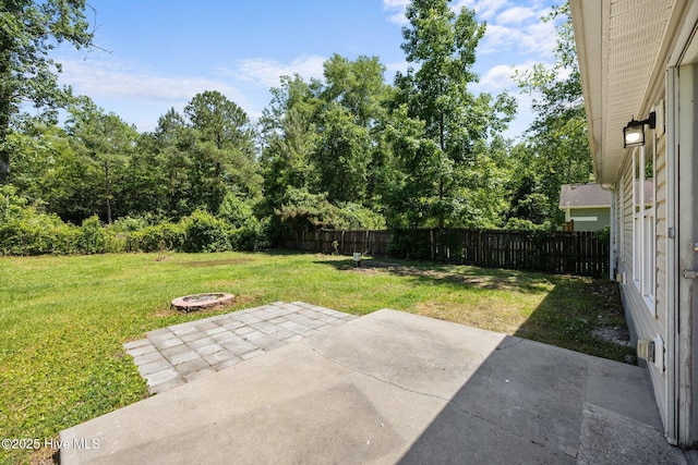 301 Haws Run Rd, Jacksonville, NC 28540 - view of yard featuring a fire pit and a patio area