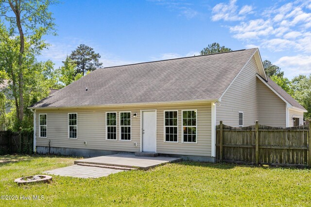 301 Haws Run Rd, Jacksonville, NC 28540 - back of house featuring a patio and roof with shingles