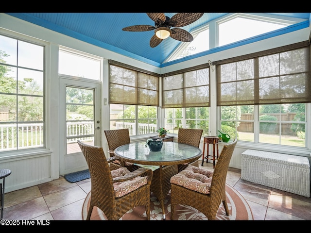 1133 Grandiflora Dr, Leland, NC 28451 - sunroom with radiator, plenty of natural light, a ceiling fan, and high vaulted ceiling
