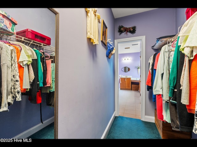 1133 Grandiflora Dr, Leland, NC 28451 - walk in closet featuring tile patterned floors