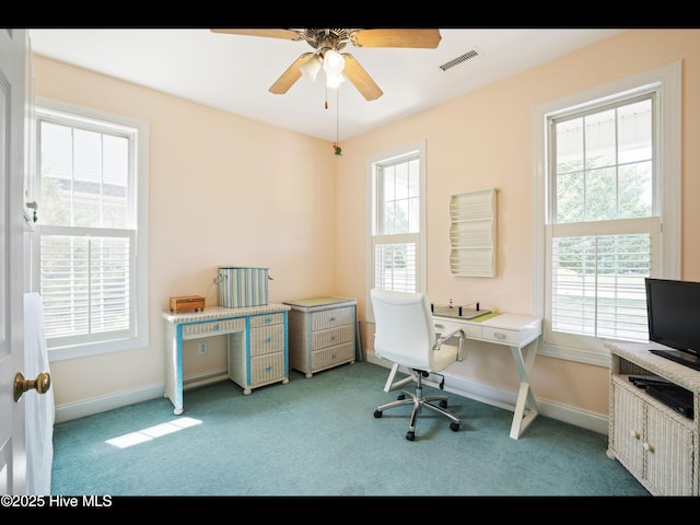 1133 Grandiflora Dr, Leland, NC 28451 - home office featuring carpet flooring, ceiling fan, and baseboards